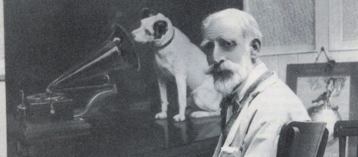 Francis Barraud with his painting of Nipper, the symbol for HMV